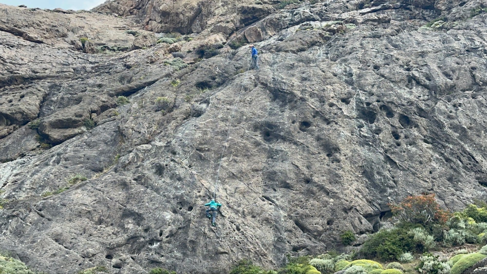 Climbing a granite wall in Patagonia